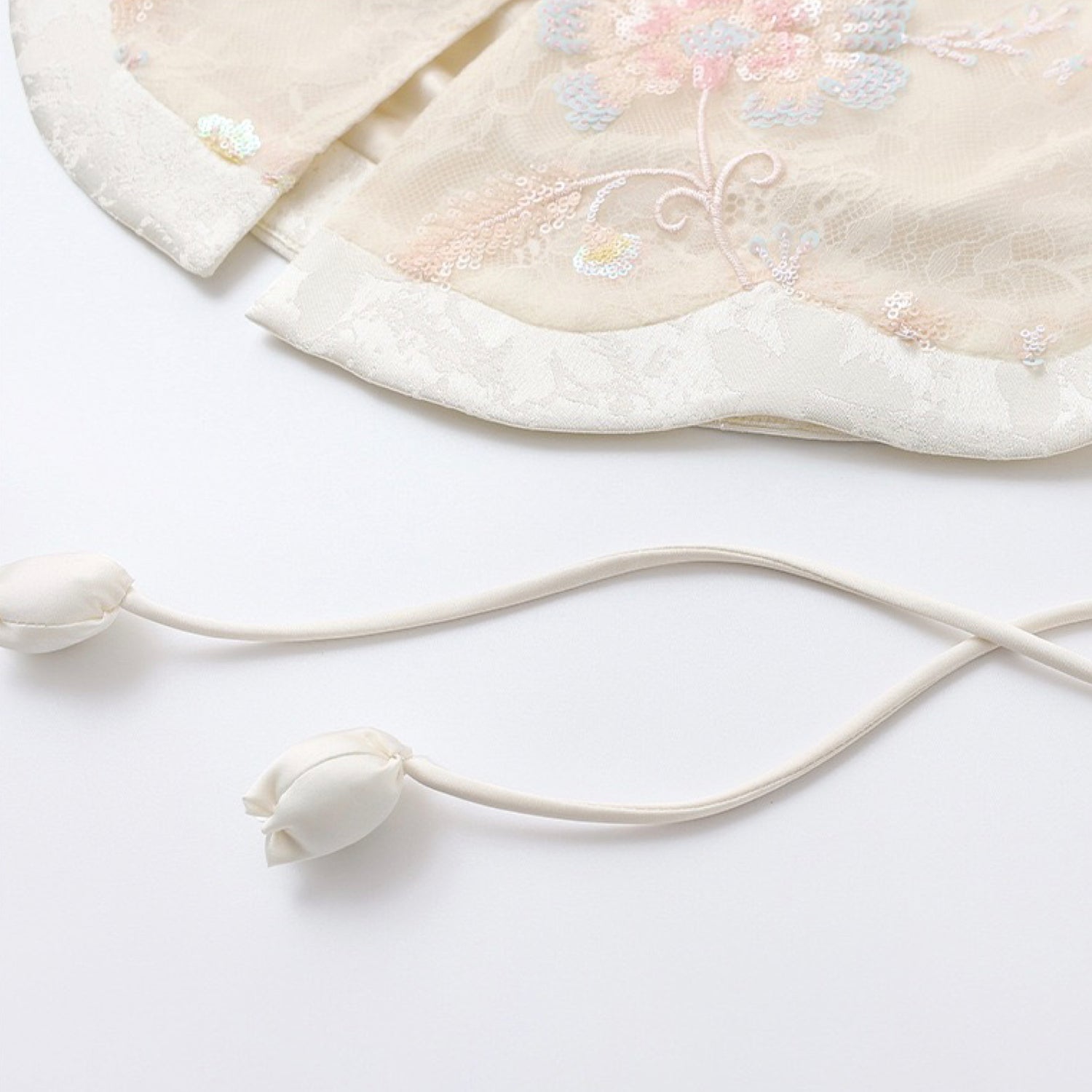 Poetic Embroidery Side Tie Sheer Floral Vest in Translucent Cream