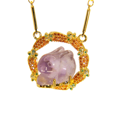 Jewelry pendant with a purple stone and gold frame WJY studio